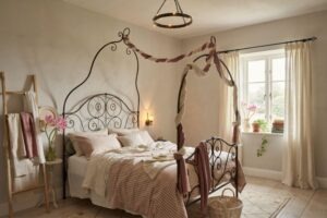 Small cozy English cottage bedroom ideas for a tiny room with a low iron bed and floral accents